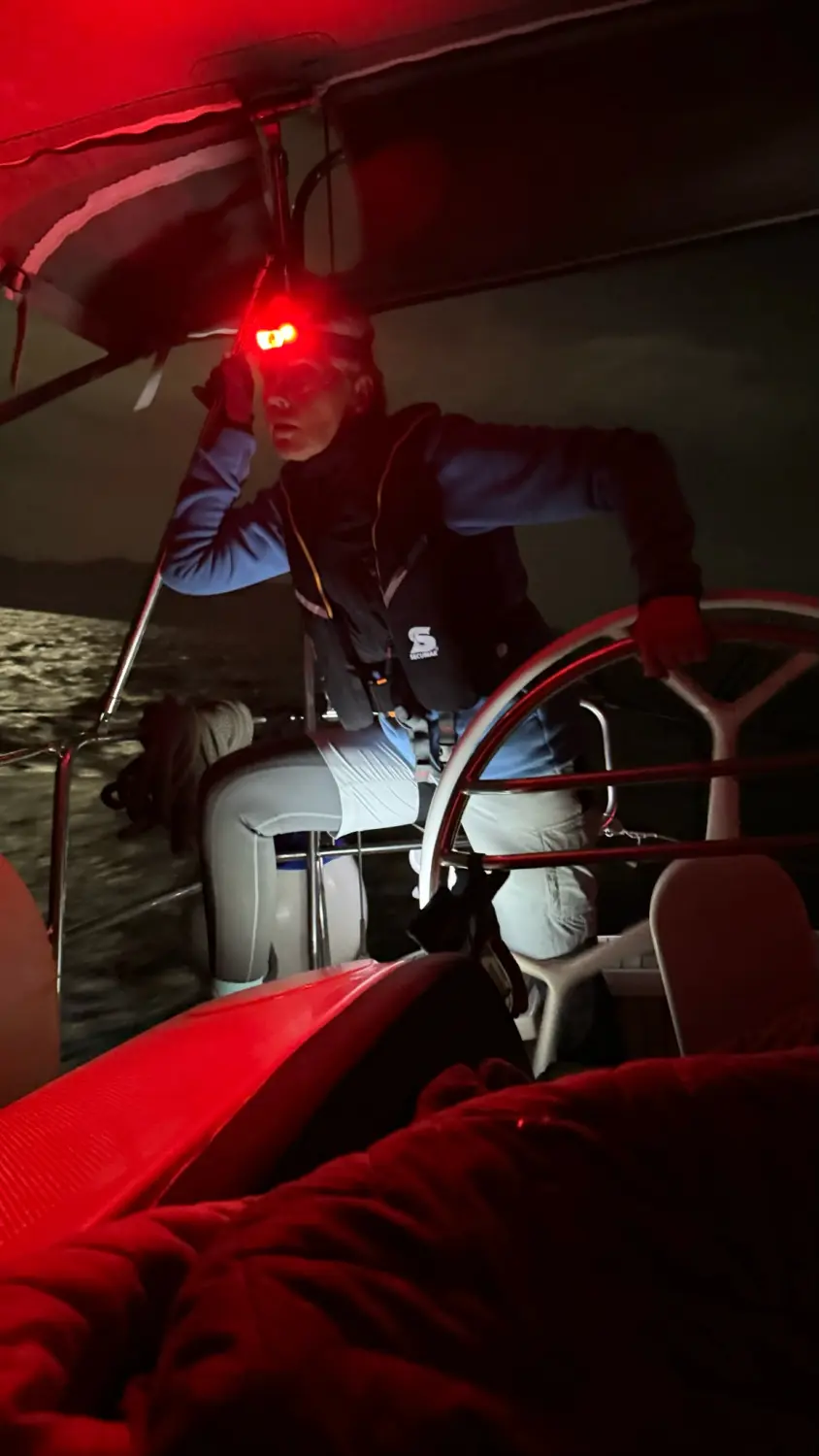 Successful Sailing - Skipper Thomas Lindloff sailing on the sea at night